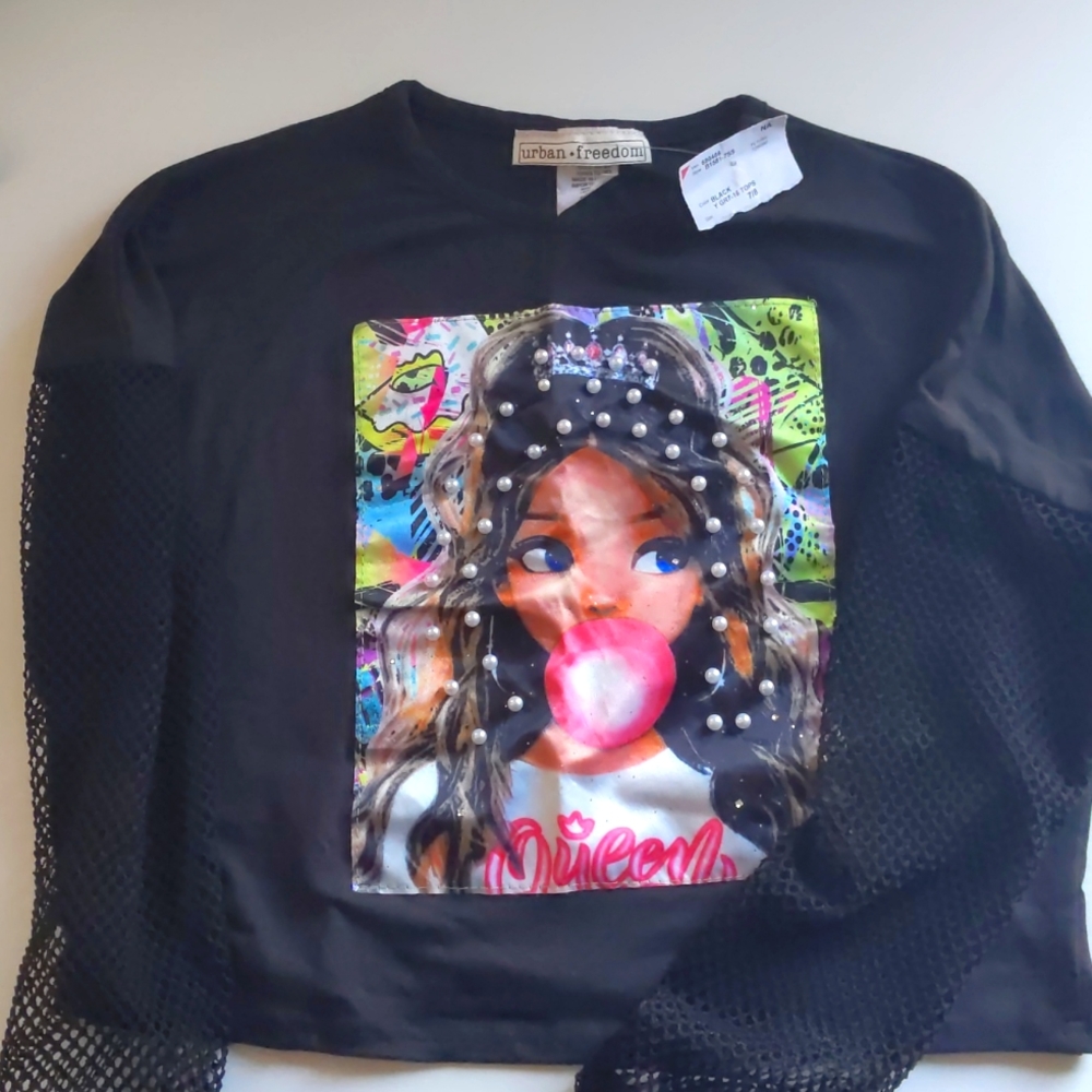 Graphic top with mesh sleeves